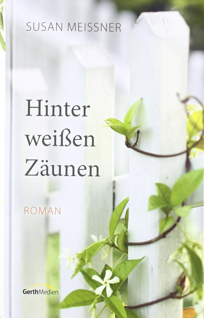 Hinter weißen Zäunen