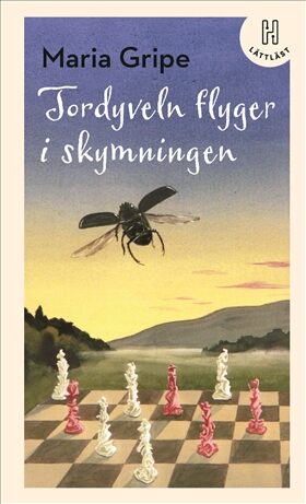 Tordyveln flyger i skymningen