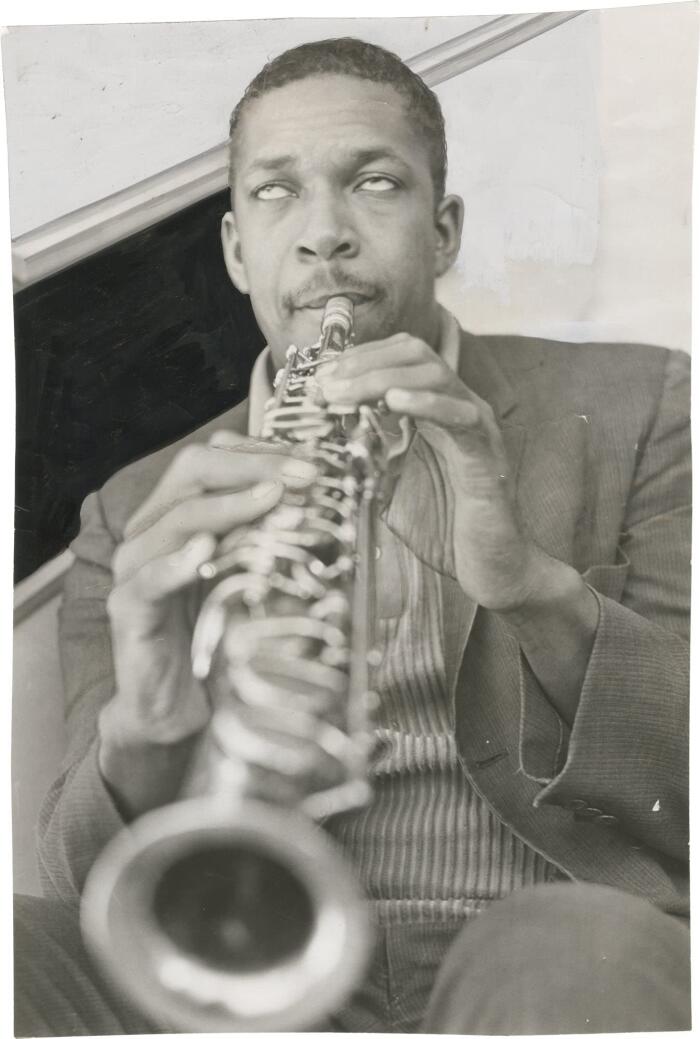 Original photograph of John Coltrane playing a soprano saxophone, 1961