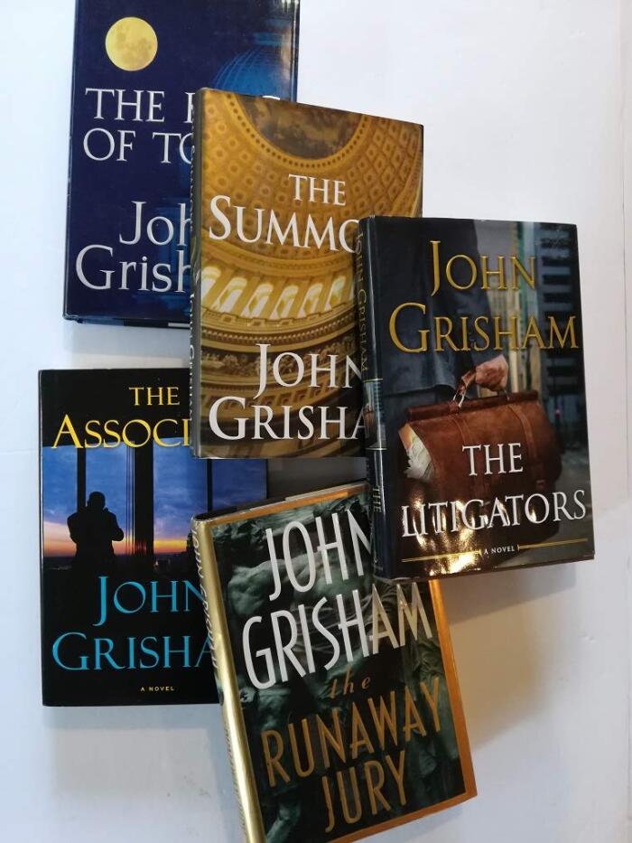 5 Legal Thrillers by John Grisham: The Runaway Jury (1996), The Summons (2002), The King of Torts (2003), The Associate (2009) and the Litigators (2011).
