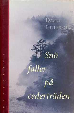 Snö faller på cederträden